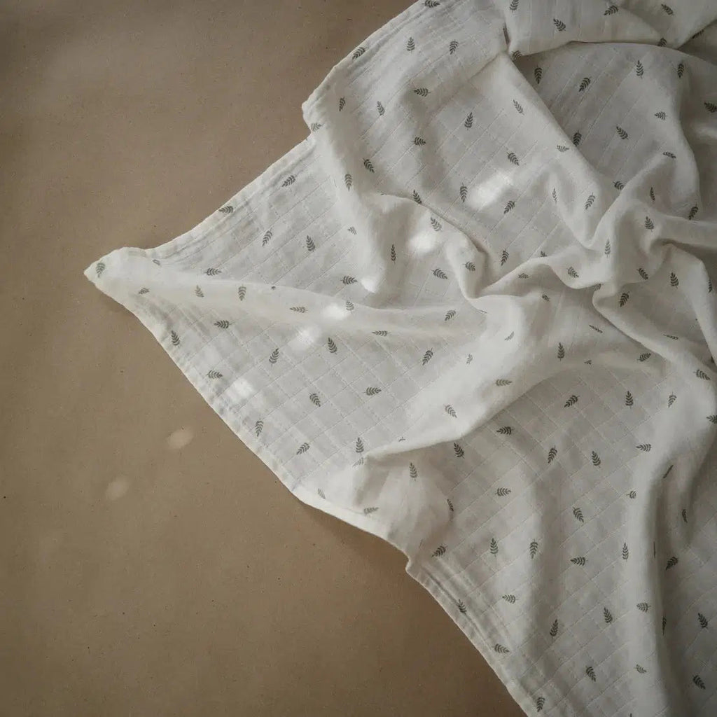 Mushie - Organic Cotton Muslin Swaddle Blanket - Leaves-Swaddle Blankets-Posh Baby